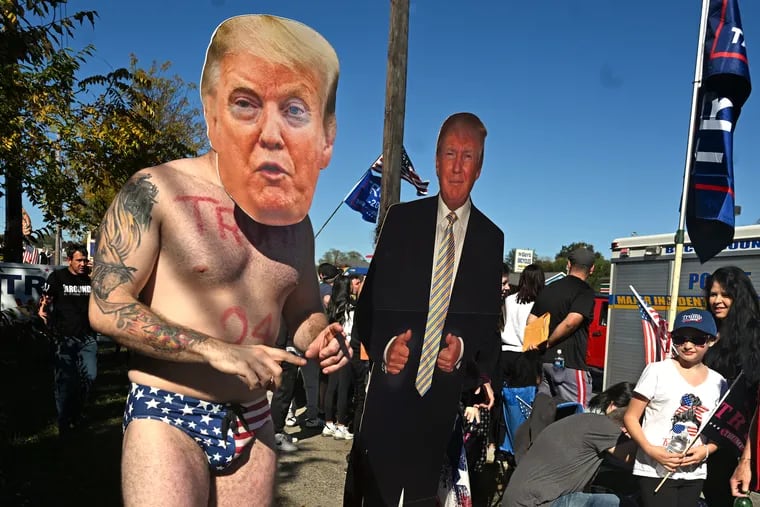 Faces in the crowd near the McDonald’s along Street Road before the arrival of former President Donald Trump in Feasterville. Trump worked the drive-thru window after saying on “Fox & Friends” he will “do everything” at the Golden Arches.