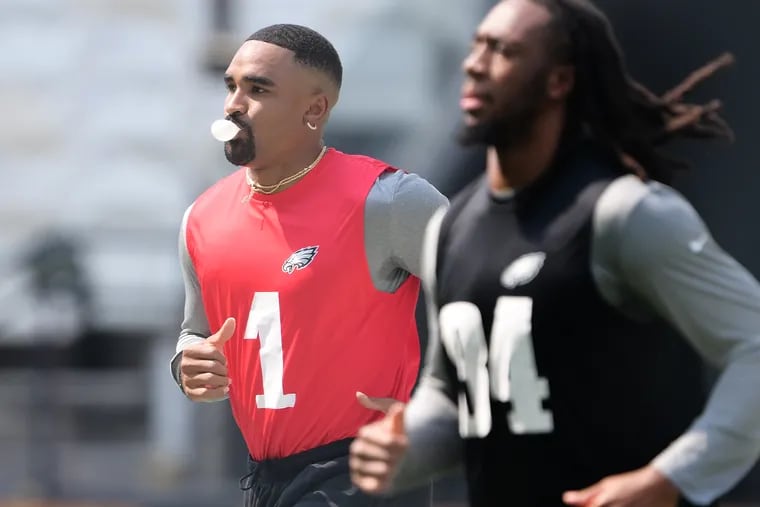 Philadelphia Eagles’ Jalen Hurts, left, practices ahead of the international game against the Green Bay Packers in Brazil.