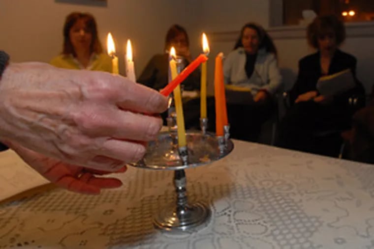 &quot;People are really fragile around this time,&quot; says Rabbi Tsurah August, lighting a candle for a &quot;Lightsin the Darkness&quot; program at the Joan Grossman Center for Chaplaincy and Healing in Elkins Park.