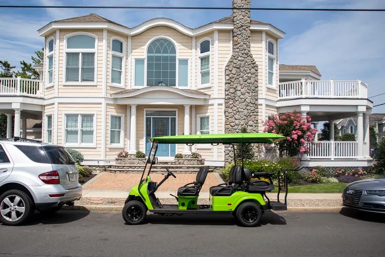 Jen Kleuskens, entrepreneur, and her husband, Mike Kleuskens, Sky Diving Instructor, parked their golf cart close to the beach side on Friday, July 26, 2019. The two were happy about purchasing the golf cart. They got it for the convenience of not getting sand in their car and to have for the beach. They have four kids and are pretty strict about keeping their kids safe with the seatbelt.