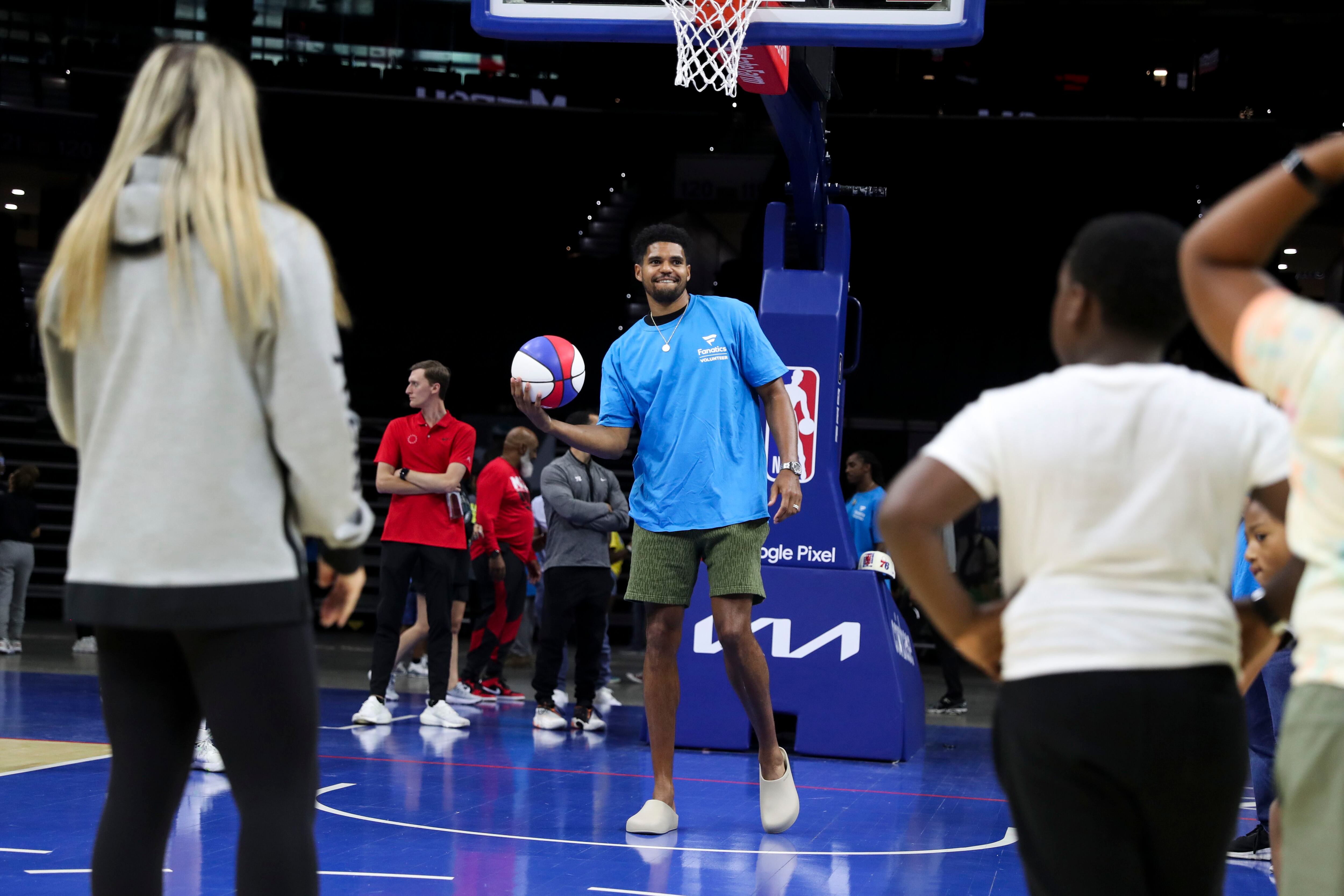 Fanatics hosts fan gear giveaway for Philly's youth with help from Joel  Embiid and Tobias Harris