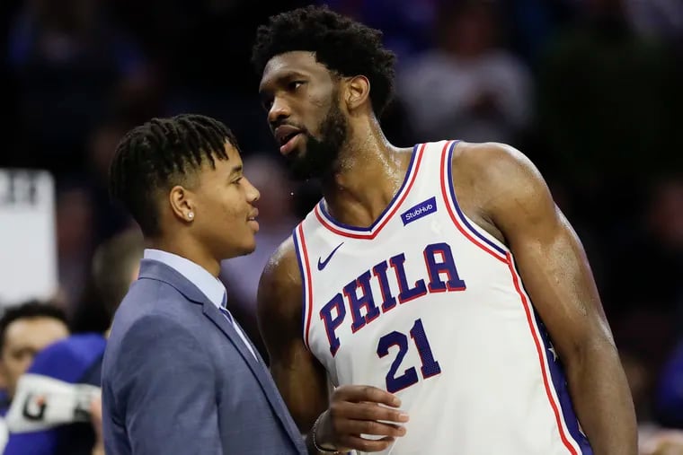 Markelle Fultz (left) has been in Los Angeles doing physical therapy to address thoracic outlet syndrome. He has not played for the 76ers since Nov. 21.