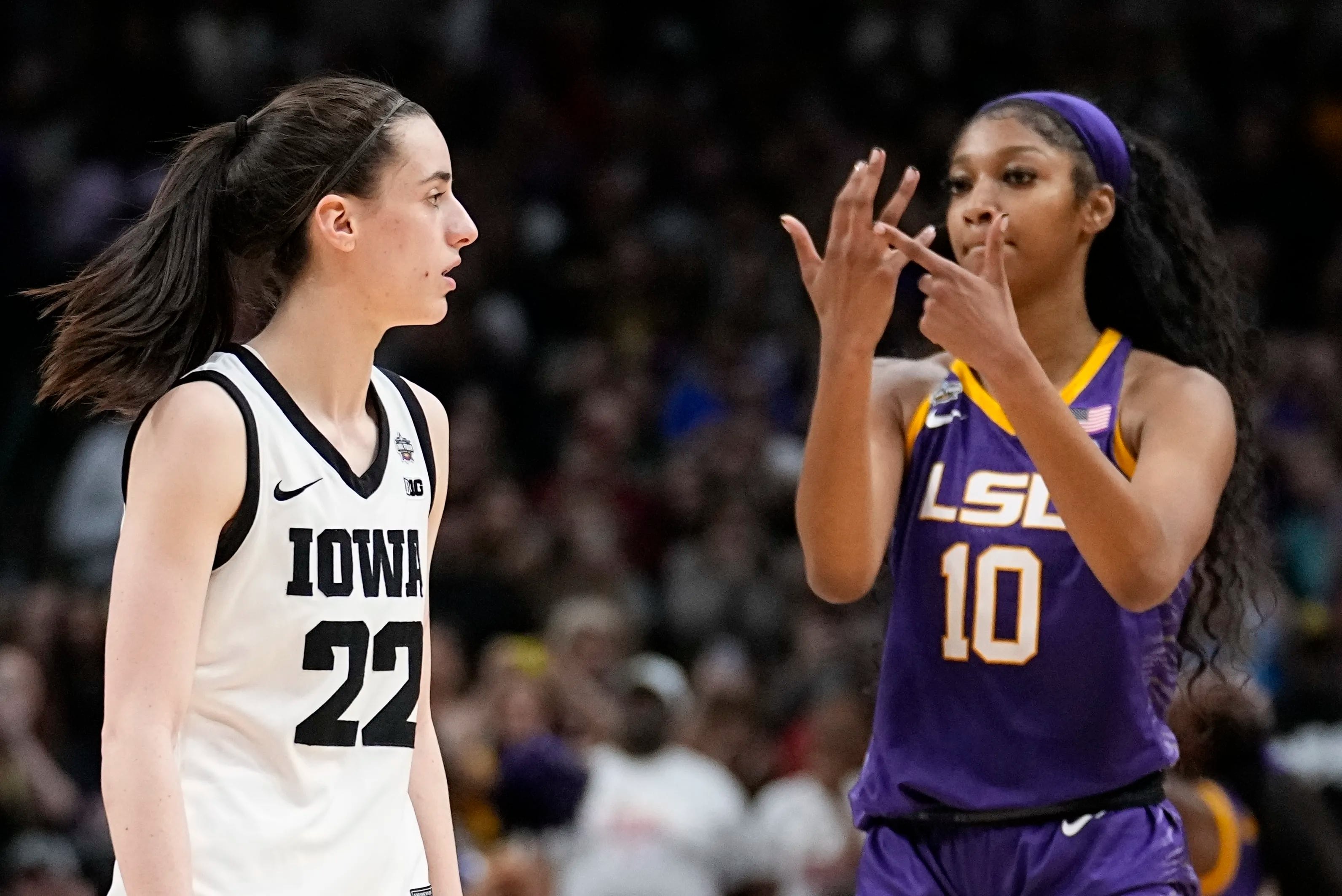 The discourse around Caitlin Clark (left) and Angel Reese began following LSU's win over Iowa in the 2023 national championship game.