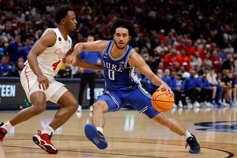 Duke's Jared McCain (0) drives against Houston's L.J. Cryer (4). Last night, the Sixers took McCain with the 16th pick.