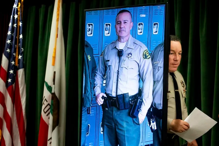 Los Angeles County Sheriff Alex Villanueva arrives to a news conference in Los Angeles on Tuesday, June 11, 2019. Rhett Nelson, 30, of St. George, Utah, was arrested Tuesday on suspicion of shooting an off-duty Los Angeles County sheriff’s deputy at a fast-food restaurant Monday, and authorities say they are investigating whether he may have killed another man an hour earlier in attacks that both appear to be random. (Sarah Reingewirtz / The Orange County Register via AP)