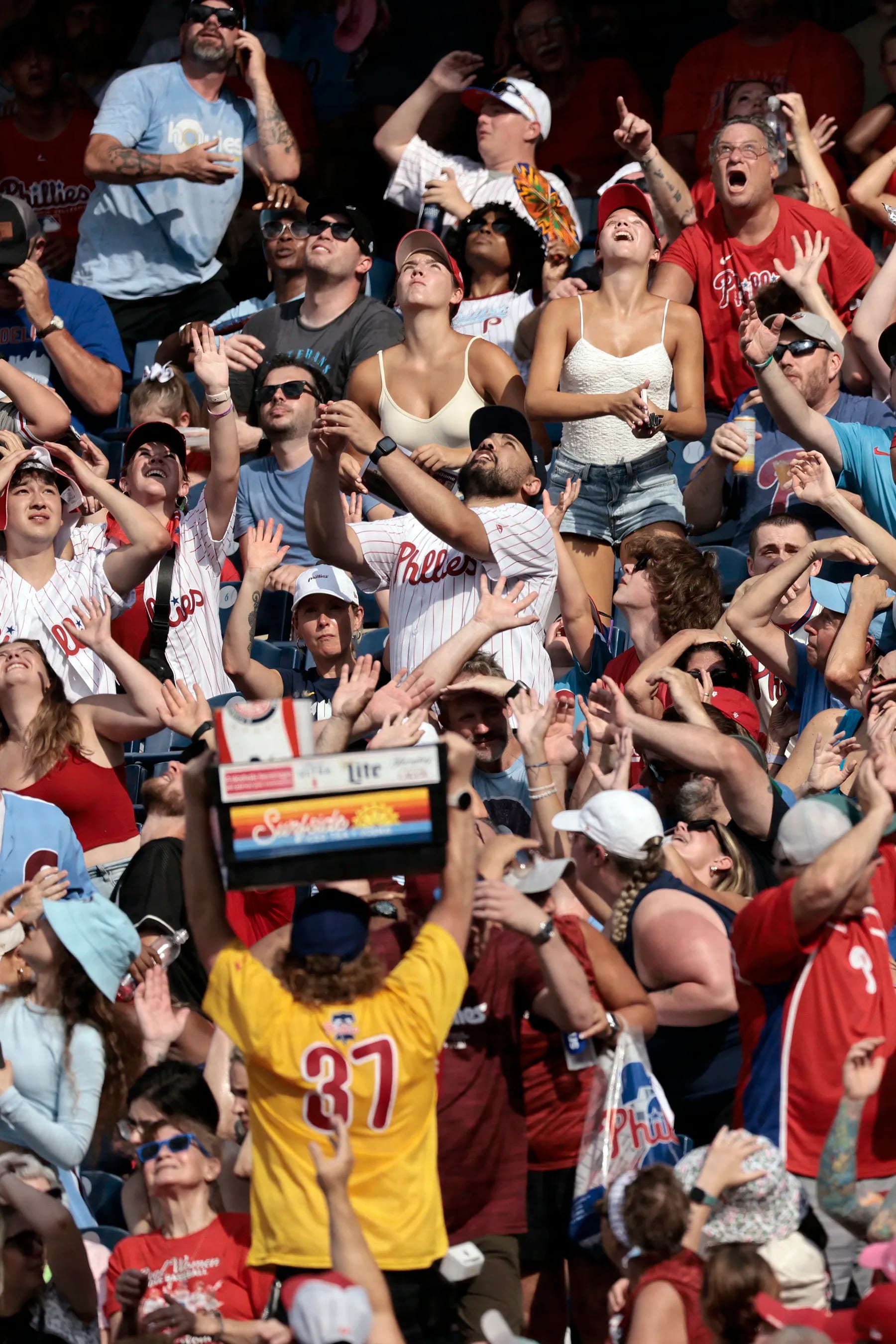 Fans keep their eyes on a foul ball during the Oakland Athletics vs. Philadelphia Phillies MLB game at Citizens Bank Park in Philadelphia on Saturday, July 13, 2024.