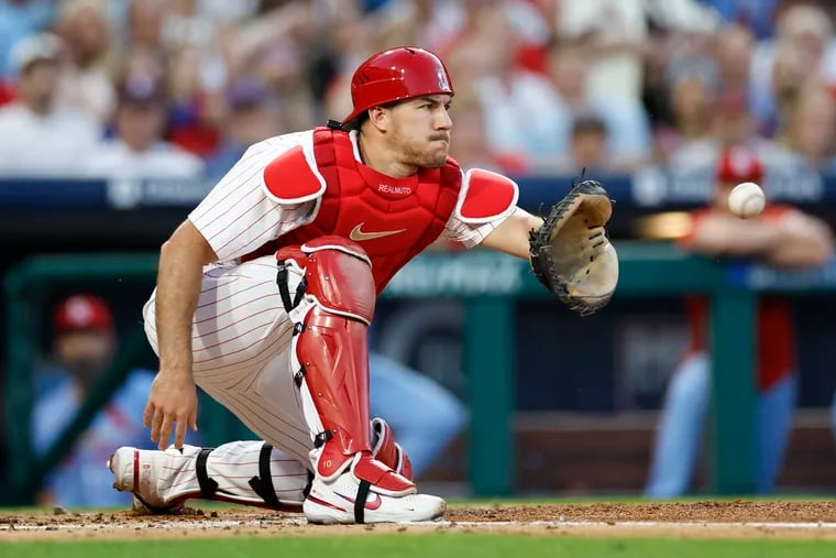 Phillies catcher J.T. Realmuto watches the baseball into his glove against the St. Louis Cardinals on June 1.