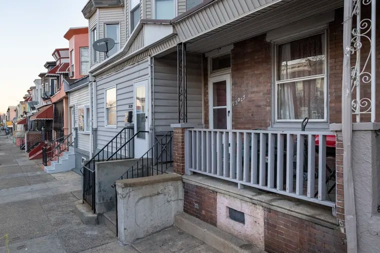 Exterior of row house on 3000 block of N. Front Street where Philadelphia police were called for a report of 6 people stabbed early Friday.