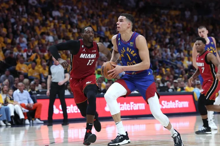 Michael Porter Jr. of the Denver Nuggets drives to the basket against Bam Adebayo of the Miami Heat during the second quarter in Game 1 of the 2023 NBA Finals at Ball Arena on June 01, 2023 in Denver, Colorado. (Photo by Matthew Stockman/Getty Images)