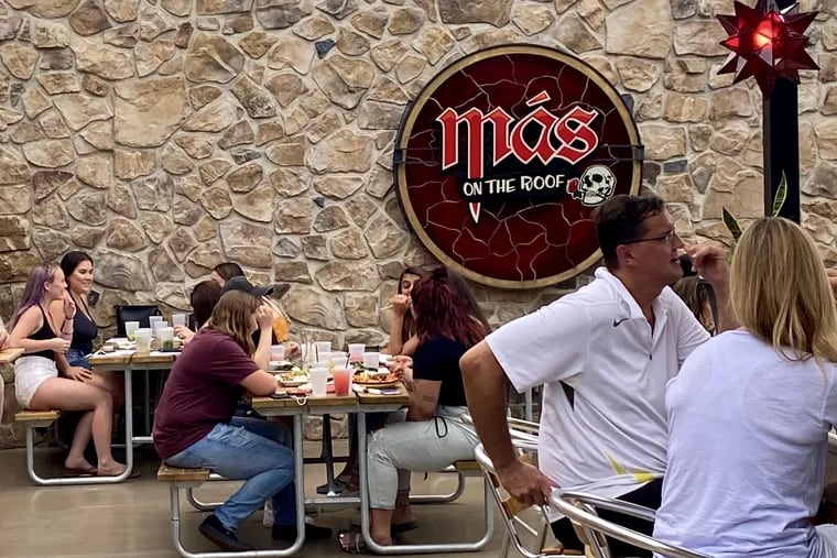 The roof deck at Mas in West Chester is a popular spot for margaritas and Mexican food.