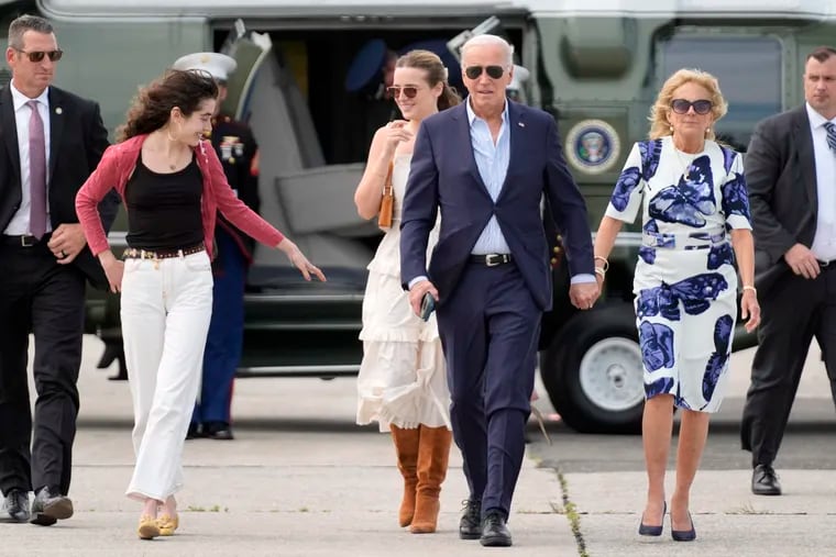 President Joe Biden, center right, and first lady Jill Biden, right, arrive on Marine One with granddaughters Natalie Biden, from left, and Finnegan Biden, at East Hampton Airport in East Hampton, N.Y., on Saturday, June 29, 2024.