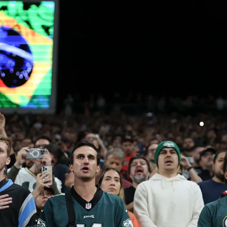 NFL fans sing Brazil's national anthem before the Eagles season opener against the Green Bay Packers at Corinthians Arena in São Paulo, Brazil.