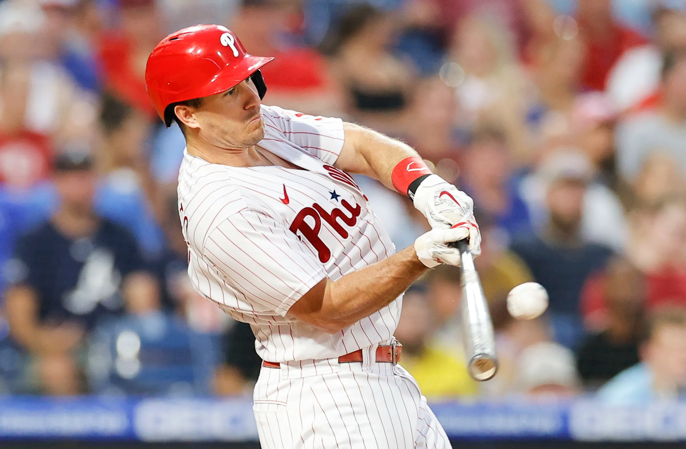 Phillies rally from 6 down, beat Bucs 12-6 to gain on Braves