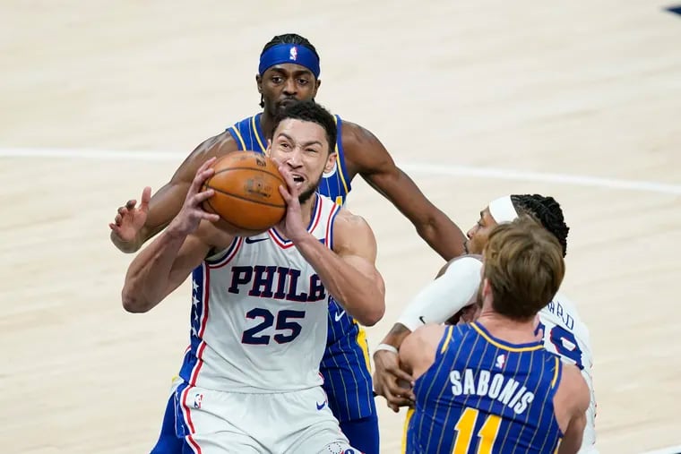 Ben Simmons (25) looks to go up for a dunk during the second half against the Pacers.