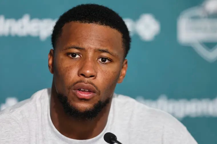 Running back Saquon Barkley is fitting right in with his new Eagles teammates after spending his first six seasons with the New York Giants.