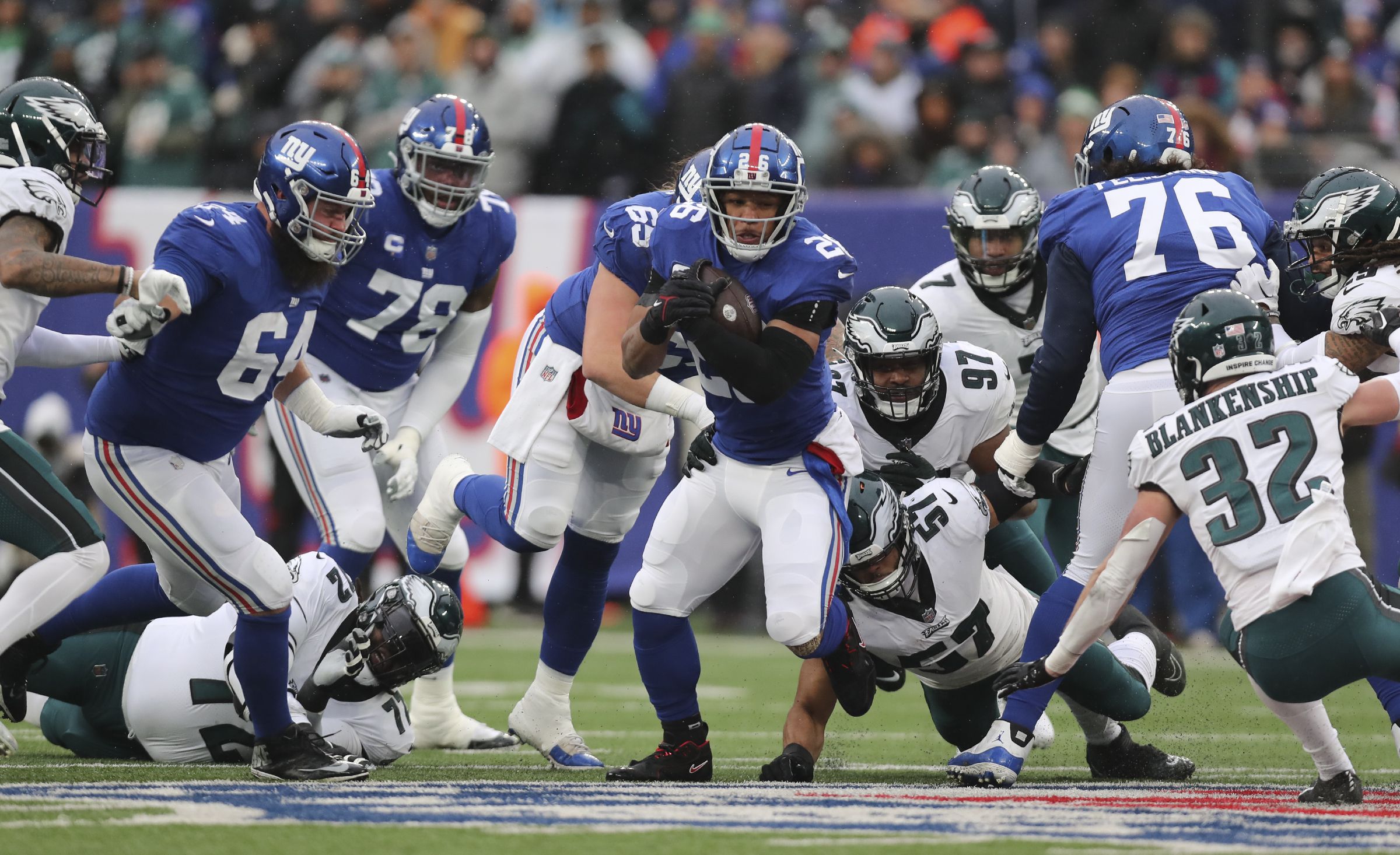 New York Giants place kicker Graham Gano (9) attempts a field goal as Jamie  Gillan (6) holds against the Philadelphia Eagles during an NFL football  game, Sunday, Jan. 8, 2023, in Philadelphia. (