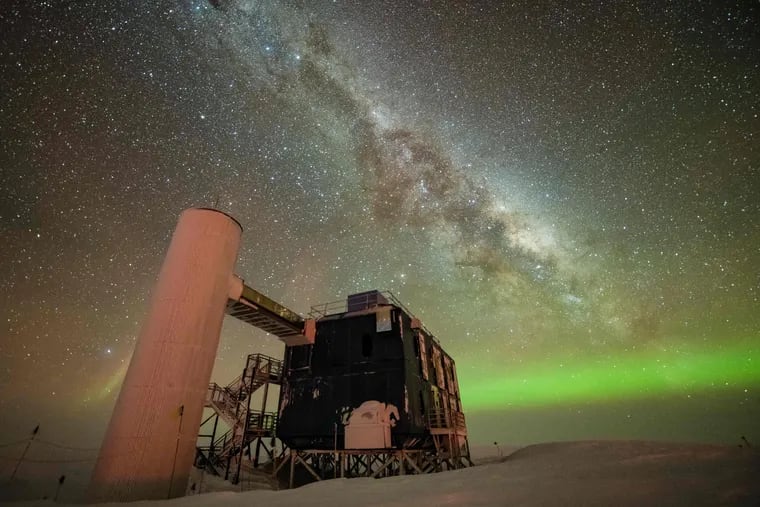 The Milky Way is visible with the naked eye, shown here at the South Pole. But the IceCube Lab, foreground, was used to view the galaxy in a different way, using 'ghost particles' called neutrinos.