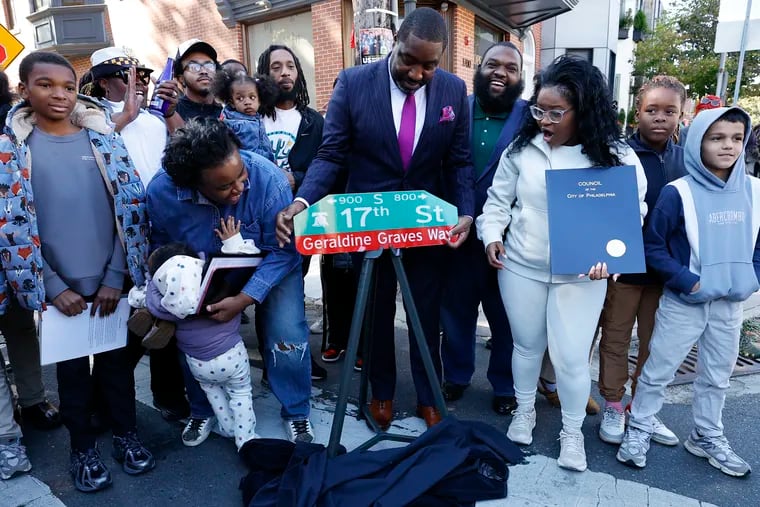 Philadelphia City Council President Kenyatta Johnson unveils the street sign in honor of Geraldine Graves with Graves’ family, friends and students from E.M. Stanton Elementary at 17th and Christian Streets.