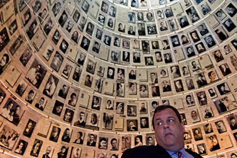 New Jersey Gov. Christie visited the Hall of Names at the Yad Vashem Holocaust Memorial museum in Jerusalem on Tuesday. Christie kicked off his first official overseas trip Monday, meeting Israel's prime minister and visiting the Western Wall. BERNAT ARMANGUE / AP