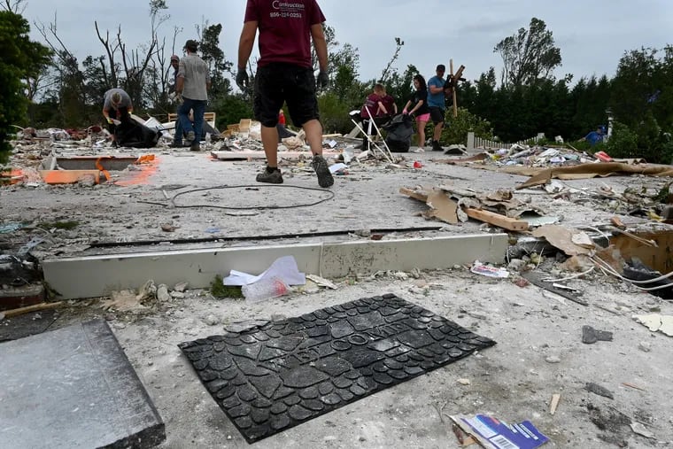 The front door mat remains at the completely flattened Mullica Hill home of Anthony Dagrosa in September 2021 from a tornado spawned by the remnants of Ida. Hurrricanes and tropical storms do happen in September.