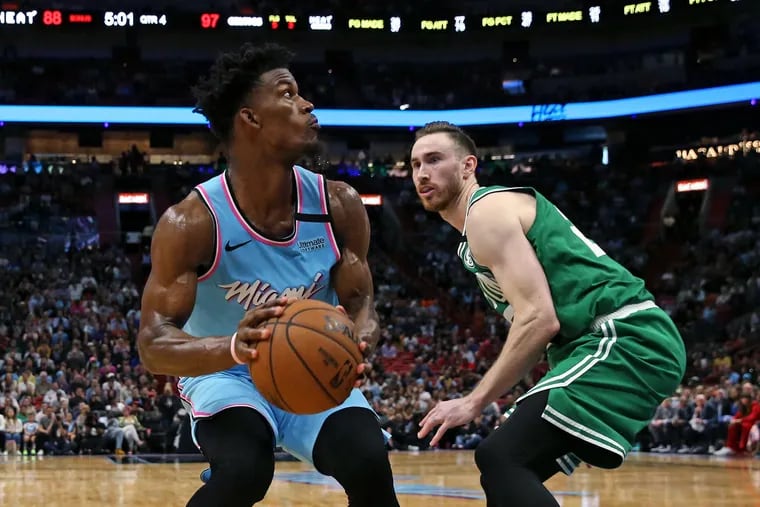 Miami Heat forward Jimmy Butler, driving against Boston Celtics forward Gordon Hayward (20),  was voted an Eastern Conference All-Star reserve.