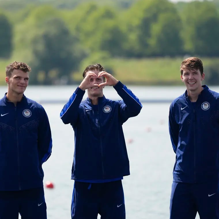 United States' Justin Best, second from right, celebrates with teammates (from left) Liam Corrigan, Michael Grady, and Nick Mead after winning gold at the Paris Olympics.