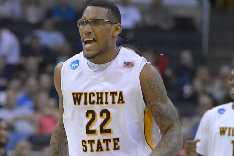 Wichita State's Carl Hall (22) celebrates a basket against La Salle as
teammate Cleanthony Early looks on during the second half. (Mark J. Terrill/AP)