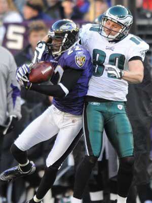 Philadelphia Eagles Kevin Curtis celebrates his touchdown on a 61-yard pass  in the first half of the football game with the Detroit Lions Sunday, Sept.  23, 2007, in Philadelphia. The Eagles are