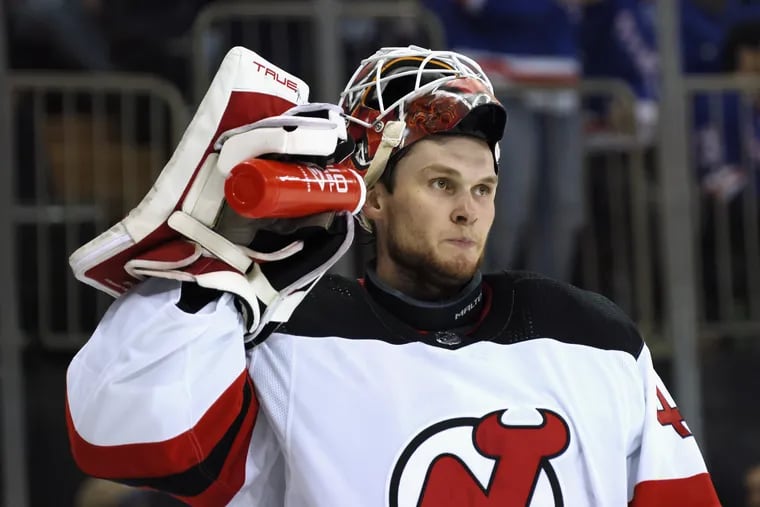 Rookie goaltender Akira Schmid helped the New Jersey Devils overcome a 2-0 series deficit against the New York Rangers by stopping 57 of 59 shots in Games 3 and 4. The 22-year-old Schmid will be back in net for Game 5 on Thursday in New Jersey. (Photo by Bruce Bennett/Getty Images)