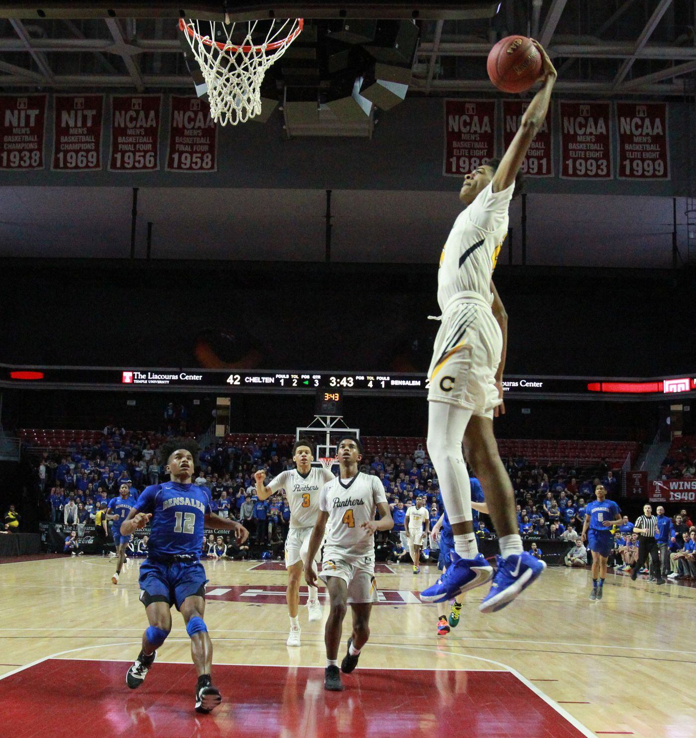 Sean Emfinger of Cheltenham goes up for a dunk against Bensalem in the District 1, Class 6A semifinals at the Liacouras Center. 