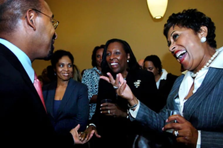 Nutter greets Beverly Muldrow (right) and other supporters at the &quot;Women for Nutter&quot; fund-raiser.