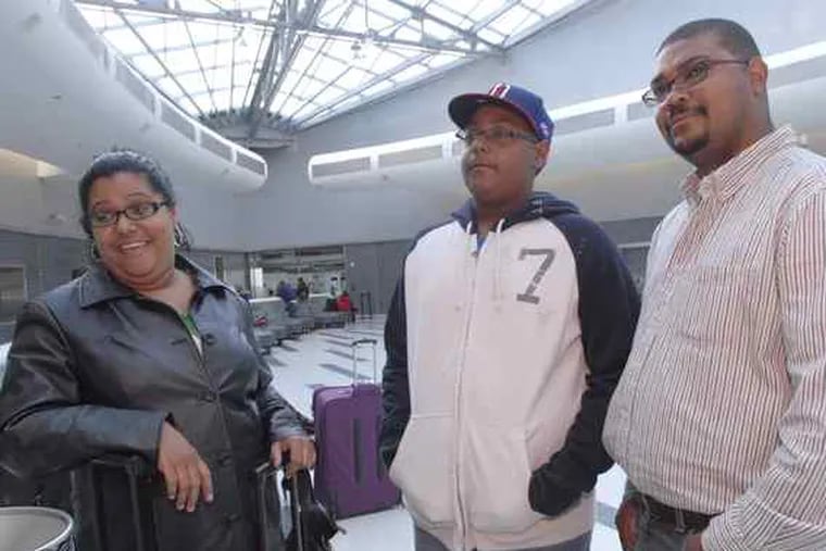 Maria Altagracia of Allentown was returning home from the Dominican Republic with her son Alexander Nathaniel and husband, Cesar Nathaniel. &quot;We noticed a lot of security,&quot; she said.