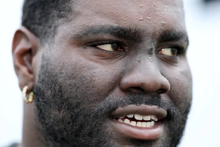 Eagles offensive lineman Mekhi Becton talks with reporters after the practice session at the NovaCare Complex on Sunday.