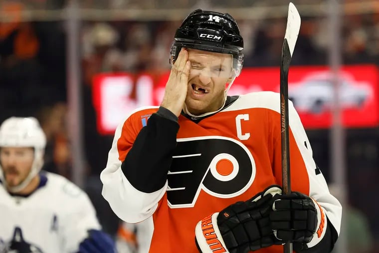 Flyers forward Sean Couturier reacts during a difficult home opener for the Flyers.