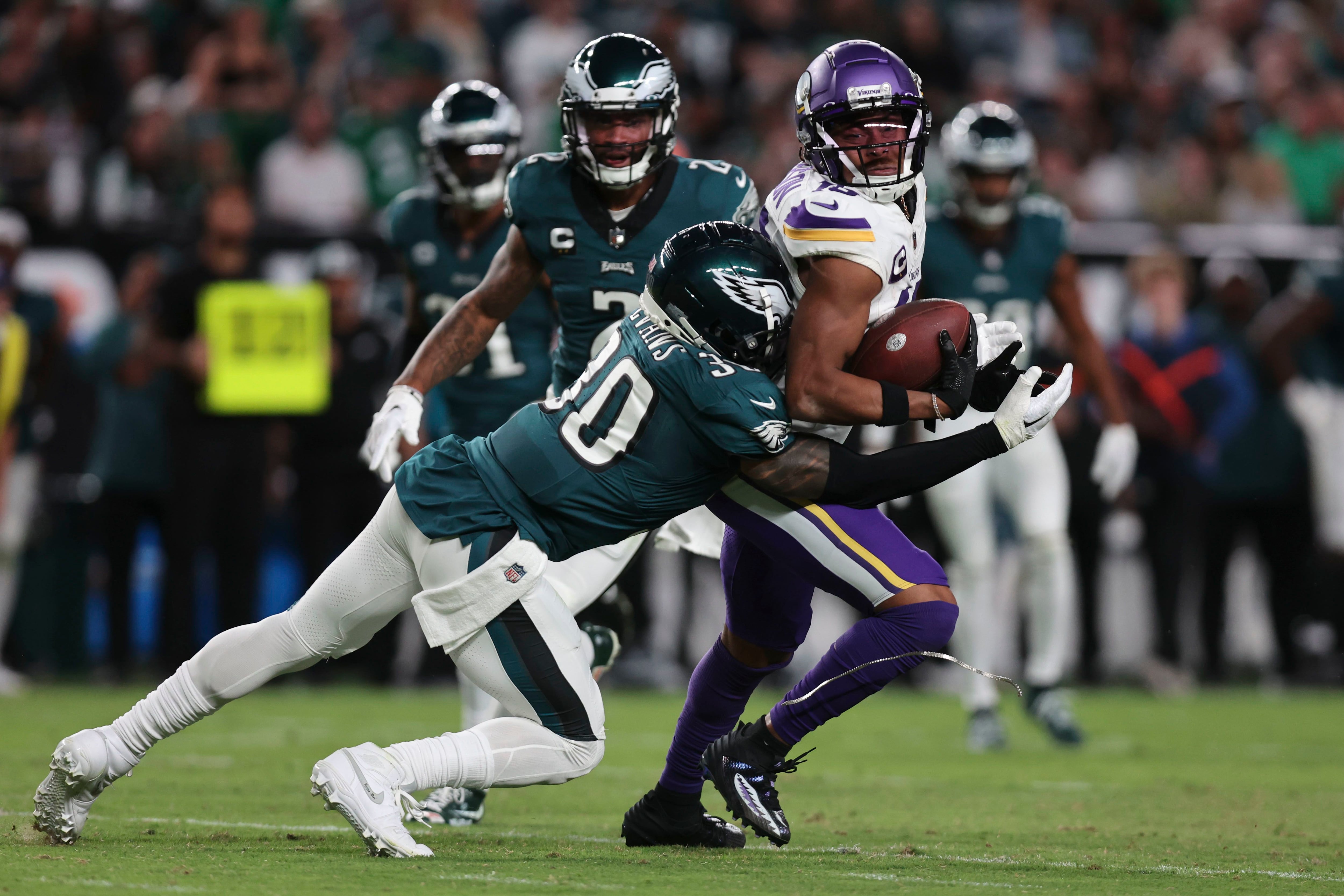 Homecoming hero D'Andre Swift runs over Minnesota Vikings in