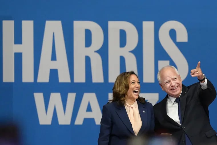 Democratic presidential nominee Vice President Kamala Harris and her running mate Minnesota Gov. Tim Walz at a campaign rally in Philadelphia on August 6, 2024.