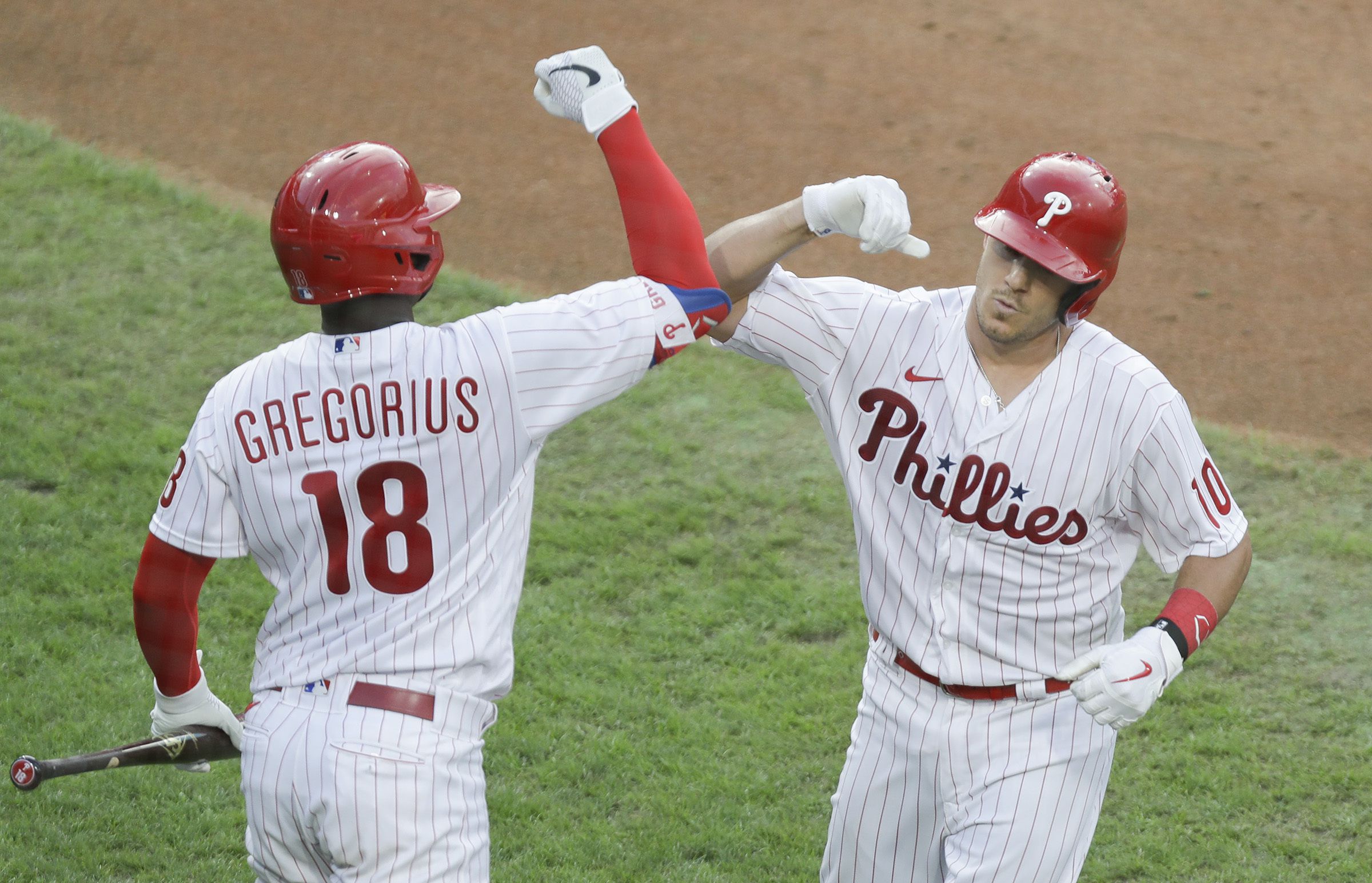 Manager Joe Girardi, Rhys Hoskins, J.T. Realmuto, Scott Kingery