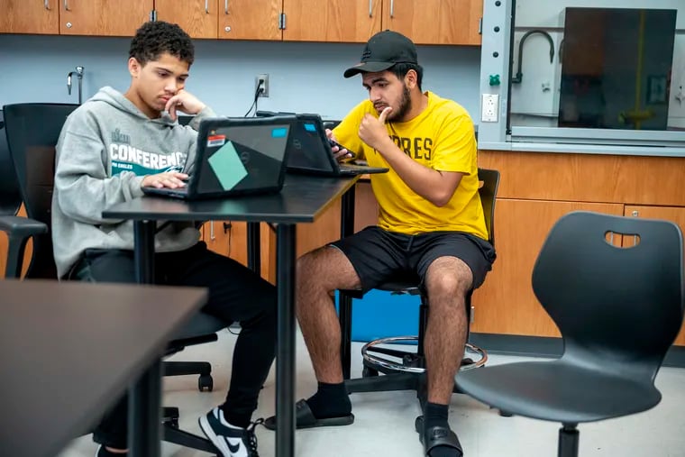 Rising freshman Jose Reyes (left) and rising senior Angel Miranda (right) in summer class at Camden High School Tuesday, Aug. 1, 2023. Camden's summer school program is winding down this week and some students have a lot riding on it: a chance to make up failed classes and get back on track for the 2023-2024 school year.