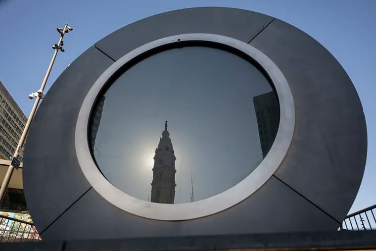 The Portal art installation is shown under repair on Monday Oct. 21, 2024 at Love Park in Philadelphia, Pa. The Portal, an artist's installation connecting cities around the world was installed at Love Park and its been repair from a crack at the bottom of the screen.