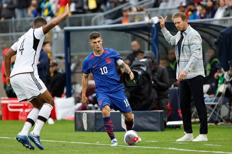 Head coach Julian Nagelsmann of Germany signals the ball is out on Christian Pulisic #10 of the United States during the first half of their International Friendly against the United States on October 14, 2023 at Rentschler Field in Hartford, Connecticut. (Photo By Winslow Townson/Getty Images)