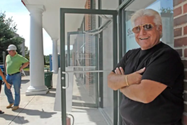 Jerry Kaplan outside his Short Hills Deli in 2008, as it reopened after a fire.