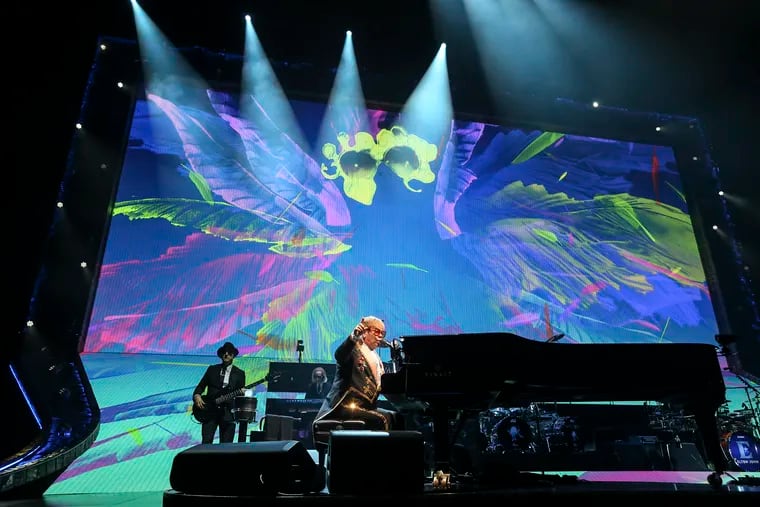 Elton John preforms in his final concert in Philadelphia at the Wells Fargo Center, an early stop on three-year old farewell tour. Tuesday, September 11, 2018. STEVEN M. FALK / Staff Photographer