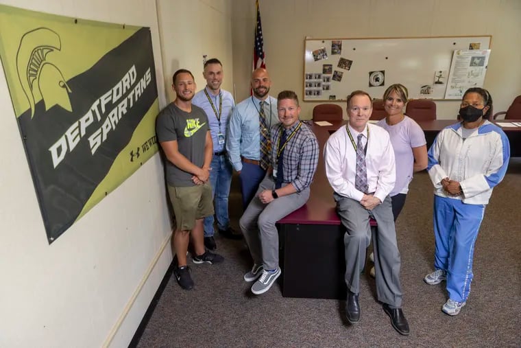 From left are Michael Bozzuffi, elementary health and PE; Sal Randazzo, coordinator of communications; John Merulla, instructional supervisor vice principal; Kevin Kanauss, chief academic officer; Arthur Dietz, superintendent; Kristin Roberts, health and PE; and Deb Shoemaker, health and PE. Teachers in Deptford Township schools have been presenting lessons to meet the Comprehensive Health and Physical Education standards for the past two years.