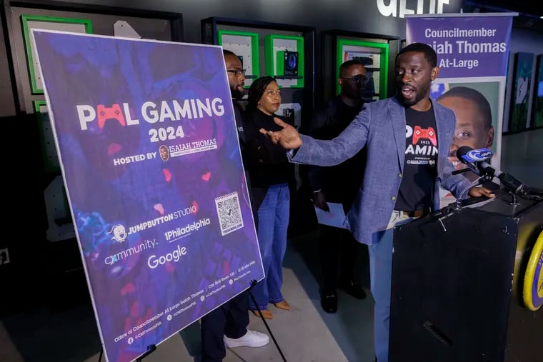 Philadelphia City Councilman Isaiah Thomas announced the second annual PHL Gaming Festival at Localhost Philly. In background from left are Nicodemus Madehdou, JumpButton Studio, Founder & CEO, Danae Mobley, 1Philadelphia, CEO and Winton Steward, Google, Head of Government Affairs and Public Policy.