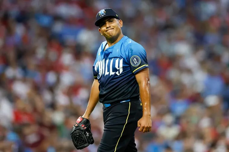 Phillies pitcher Ranger Suarez reacts after giving-up two solo home runs to the Braves in the third inning.