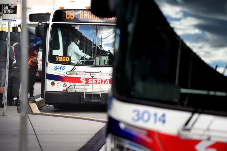 Passengers board a SEPTA bus. With a strike possible on Nov. 1, the Philadelphia School District is exploring contingency plans. Nearly 60,000 students rely on the transit authority to get to school, and classes may need to go virtual if a strike is called.