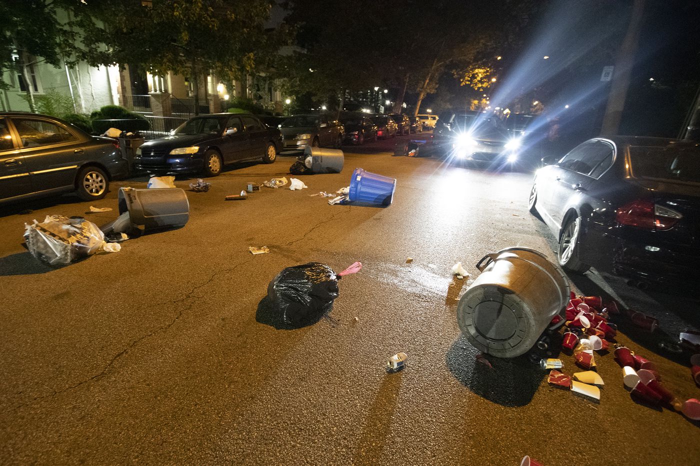 Garbage cans thrown in the street by a group of protesters marching in response to the Jacob Blake shooting in Wisconsin. Numerous windows were shattered at the University of Pennsylvania.