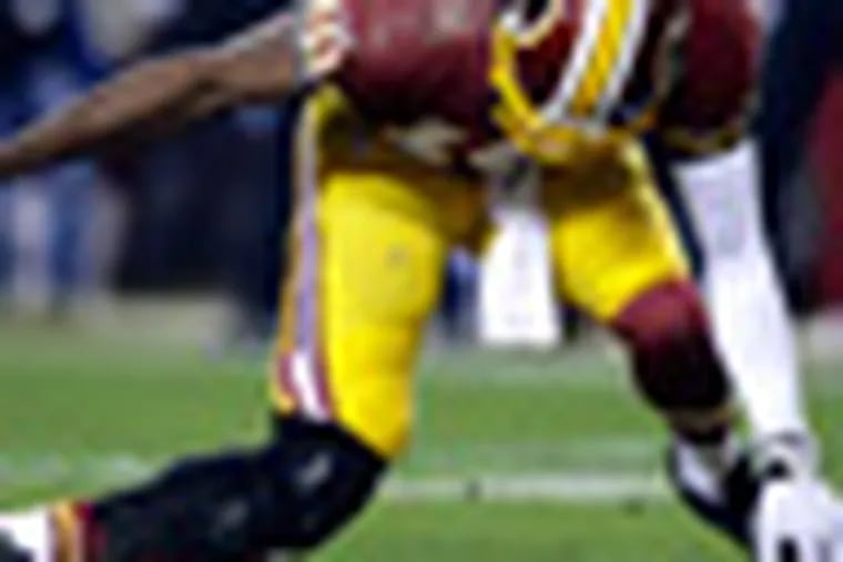 Robert Griffin III injury: Redskins QB has 'partially torn' ligaments 