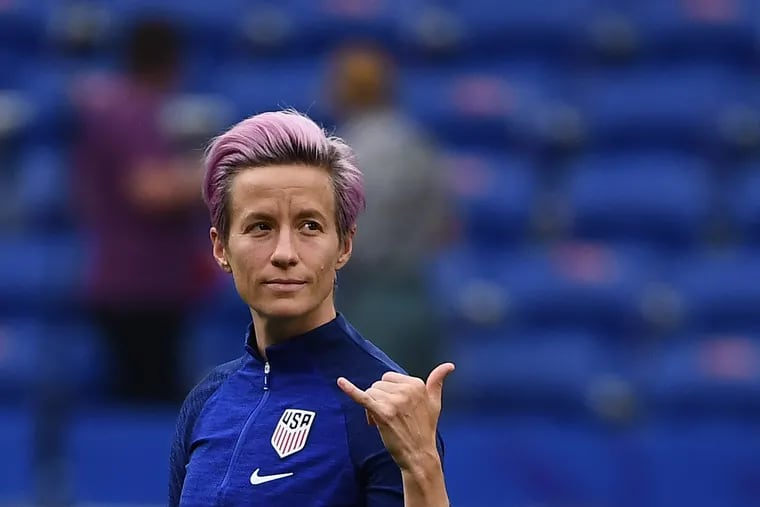 TOPSHOT - United States' forward Megan Rapinoe gestures as she walks around the pitch prior to the  France 2019 Women's World Cup semi-final football match between England and USA, on July 2, 2019, at the Lyon Satdium in Decines-Charpieu, central-eastern France. (Frankck Fife/AFP/Getty Images)