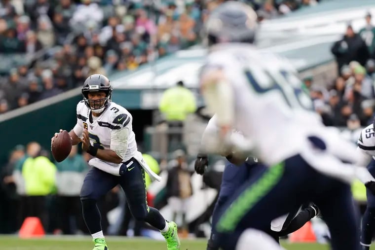 Seattle Seahawks quarterback Russell Wilson looks for a receiver against the Eagles in November.